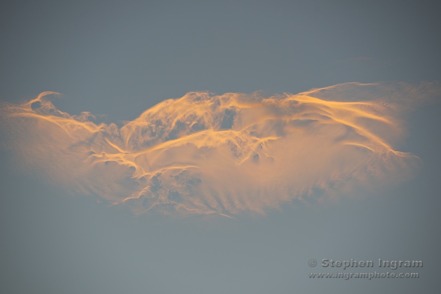 Gossamer clouds at sunset above Round Valley, CA
