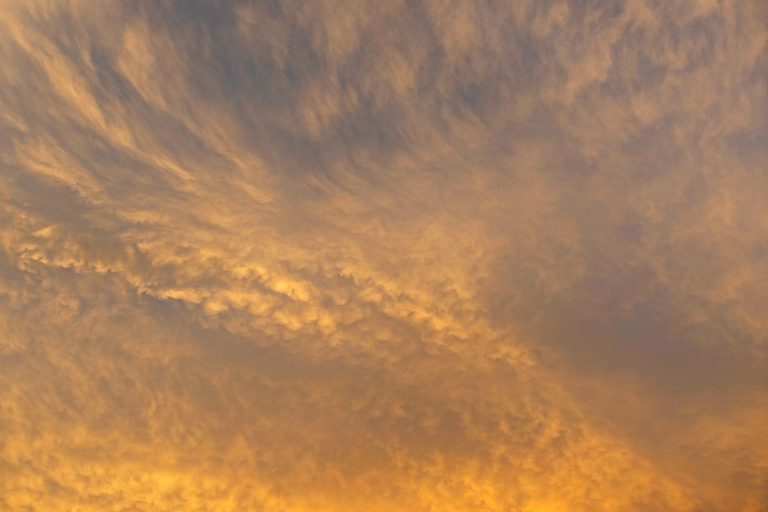 Cirrus and mammatus replace a clearing cumulonimbus cloud, from Swall Meadows, CA