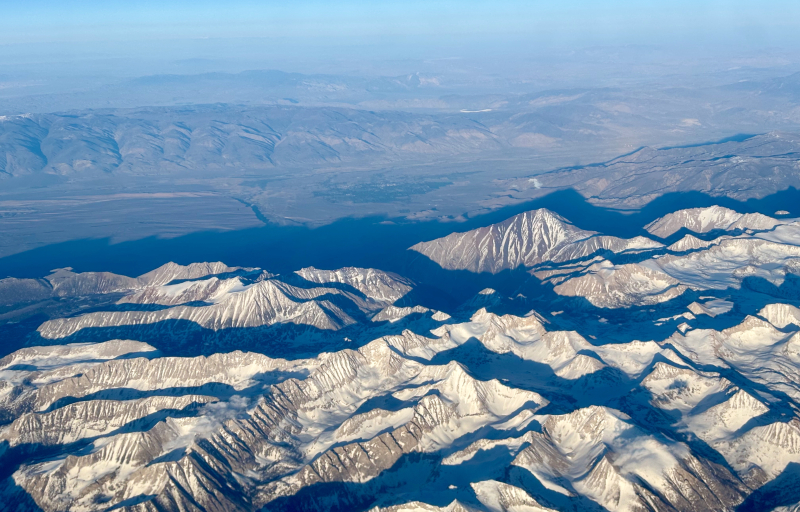 Sierra Nevada with Mt. Tom's shadow stretching over the Tungsten Hills, southwest of Bishop.